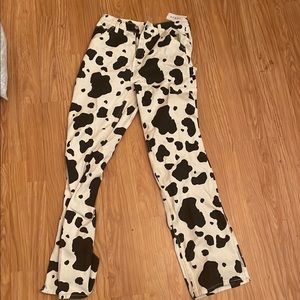 PacSun size 26 cow patterned jeans